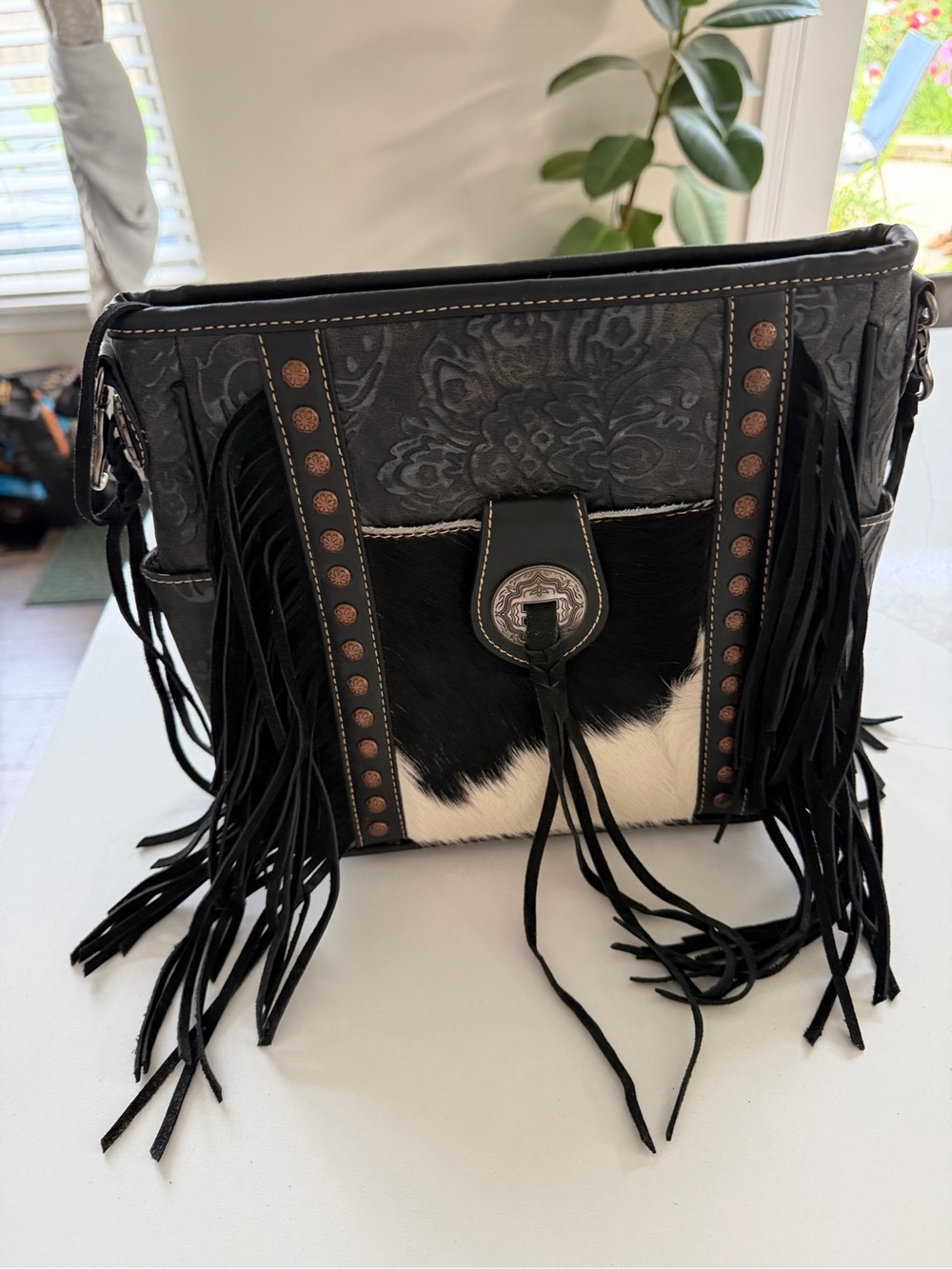 TRINITY RANCH TOOLED COWHIDE FRINGE CONCEALED CARRY CROSSBODY